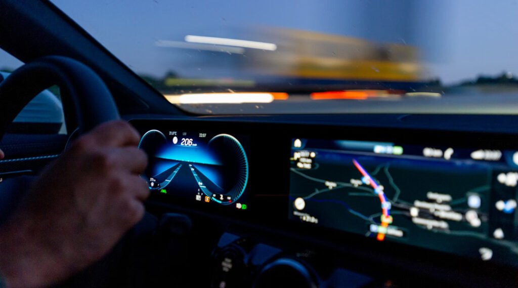 A driver is driving with Autonomous Driving car