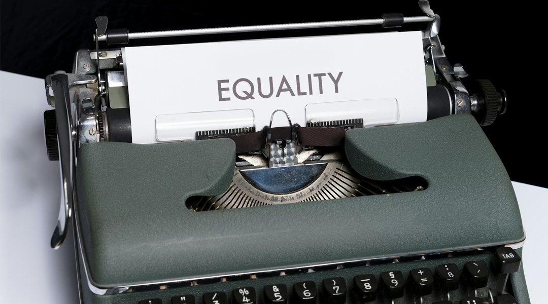 A typical printer types a word Technological Equality